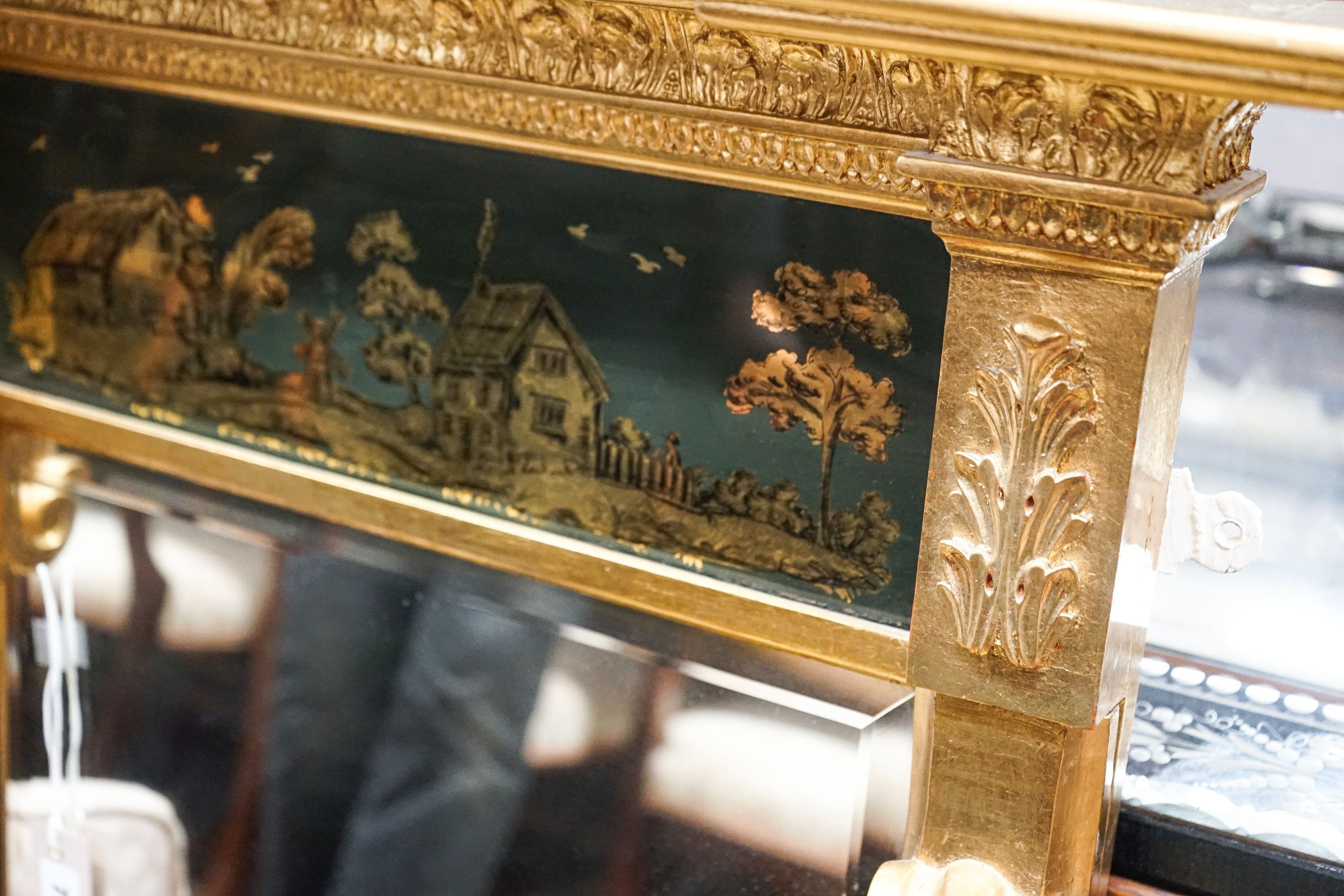 A Regency style giltwood pier glass, width 68cm, height 106cm